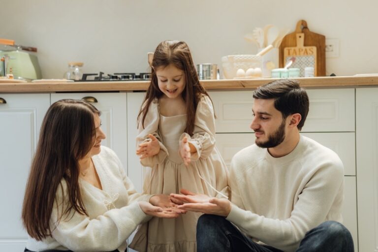 Preschooler playing with her mom and dad at home. Activities from the playful preschool curriculum, Golden Days at Home. The best at home preschool curriculum.